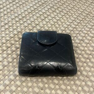 Chanel Wallet.  Great for small bags. Good vintage condition.